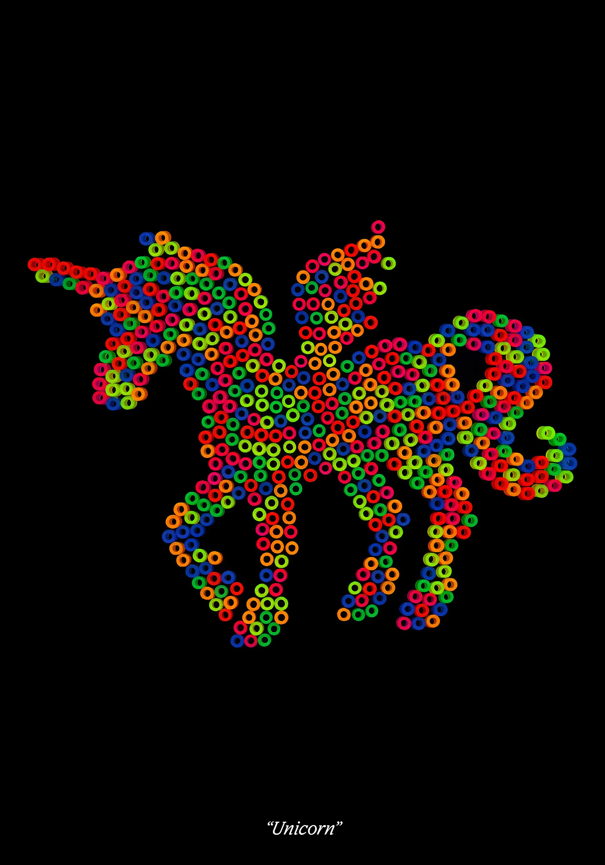 Winged unicorn made of neon fuse beads on black, titled “Unicorn”