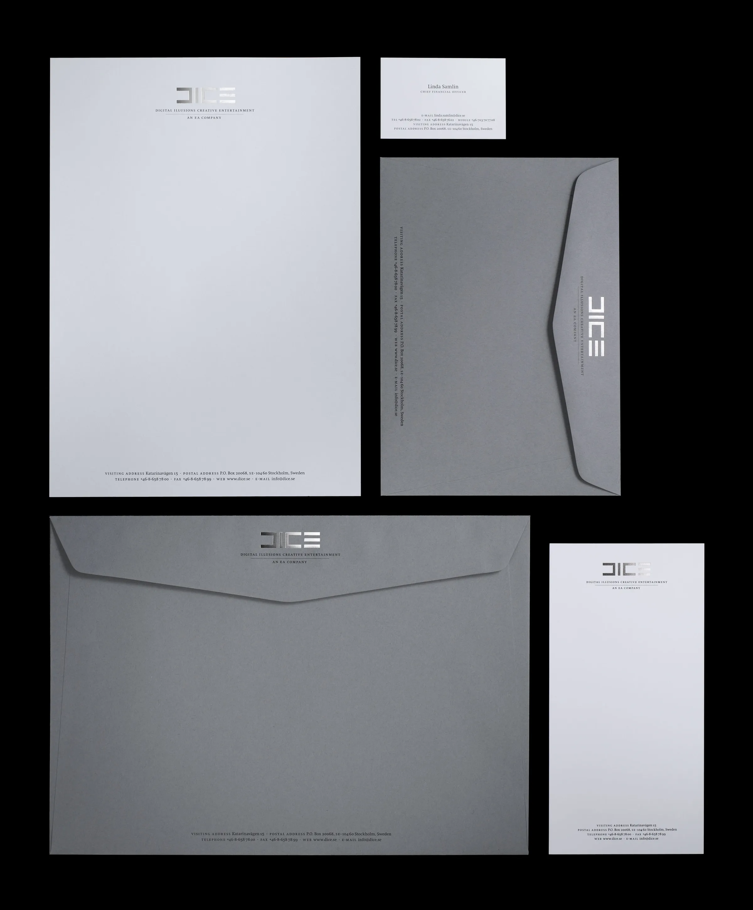 DICE stationery in white and grey: letterhead, business card, envelopes and slip with a silver logo