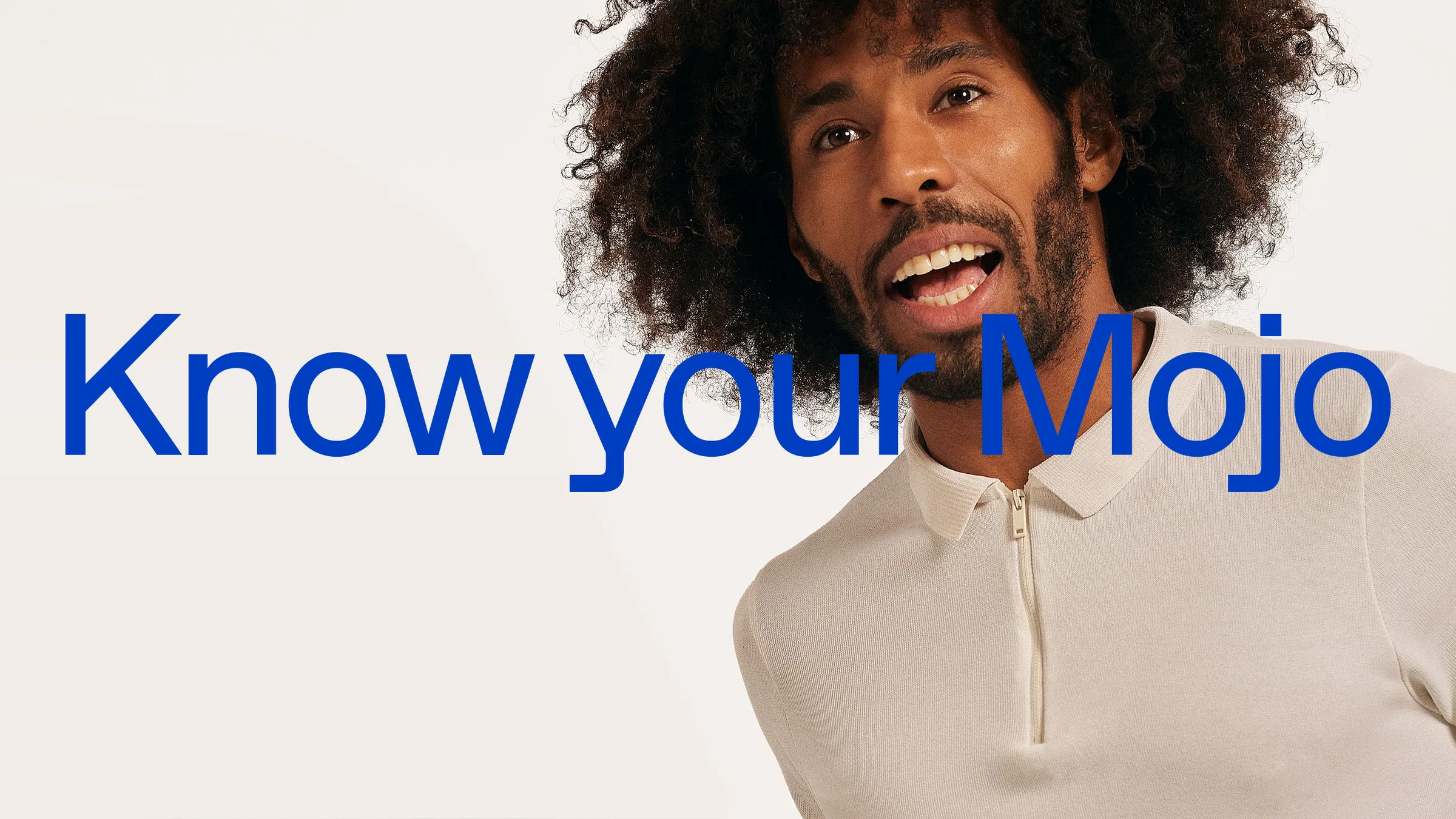 Laughing man in a cream polo behind the headline “Know your Mojo” in blue